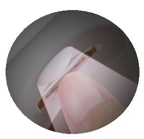 User activates built-in LED light on Electric Nail Clipper to improve visibility during precise nail trimming.